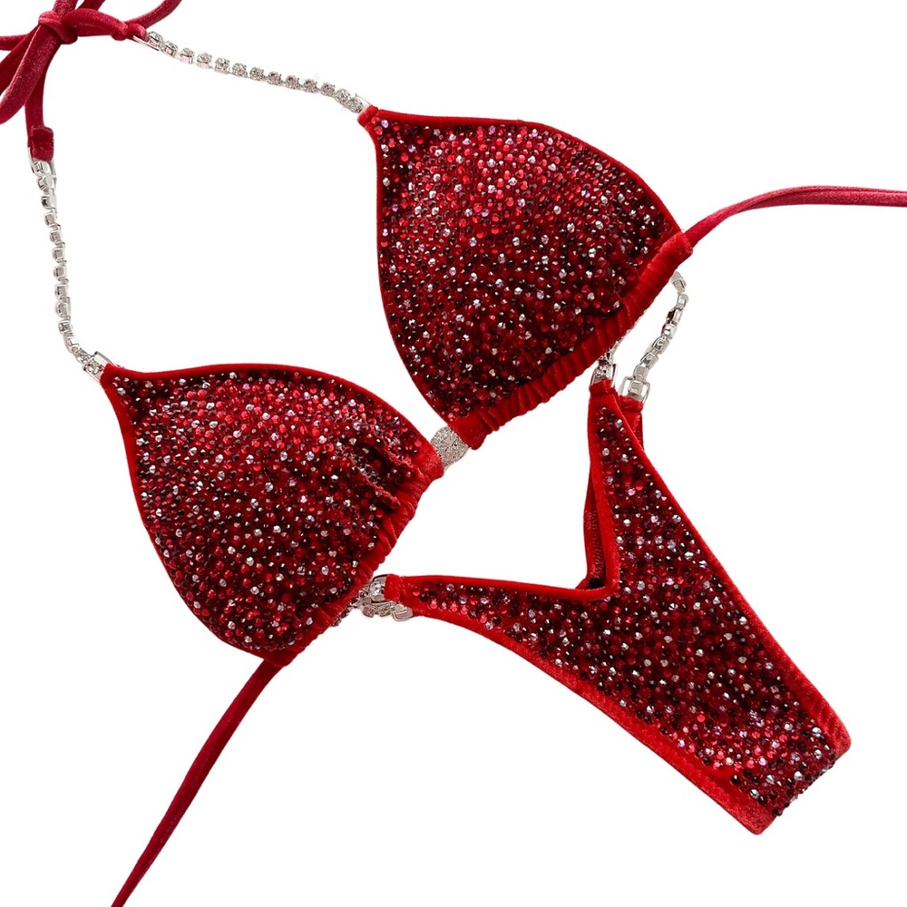 Red bikini by Toxic Angelz Bikinis, worn once, great for bodybuilding.